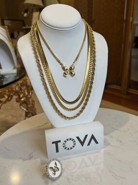 Tova Gold butterfly necklace.